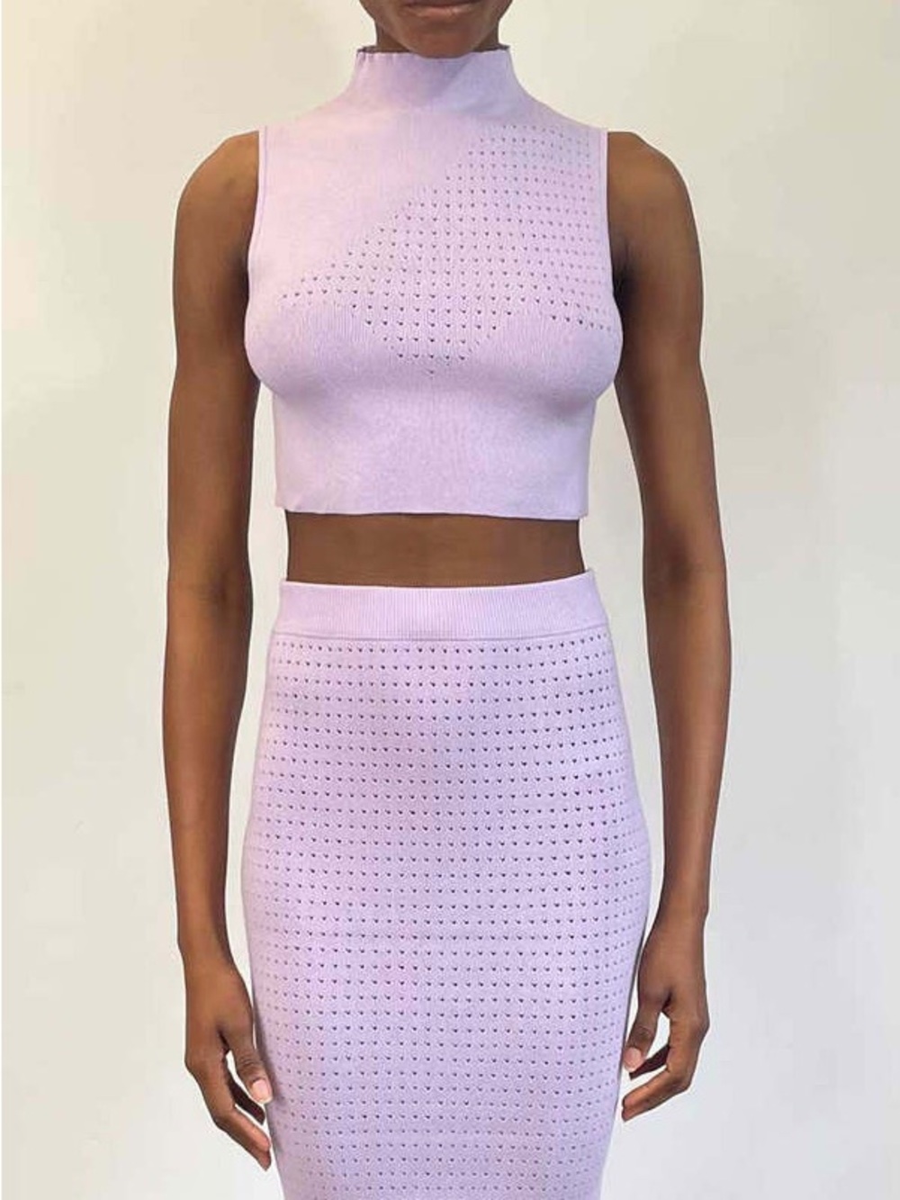 Lilac mock neck crop tank. Victor Glemaud